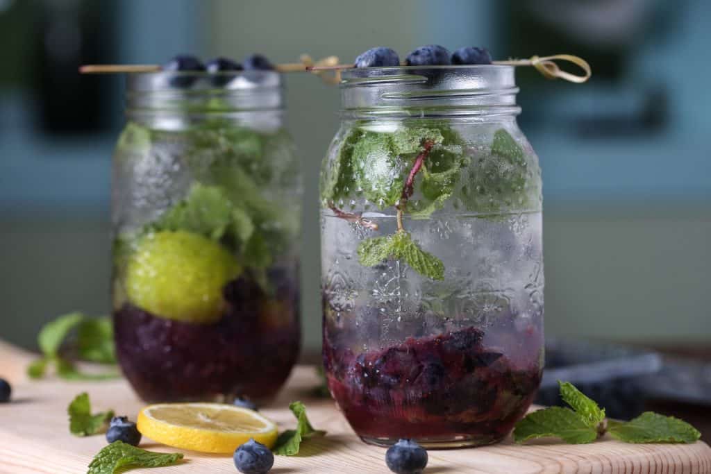 blueberries in glass jars