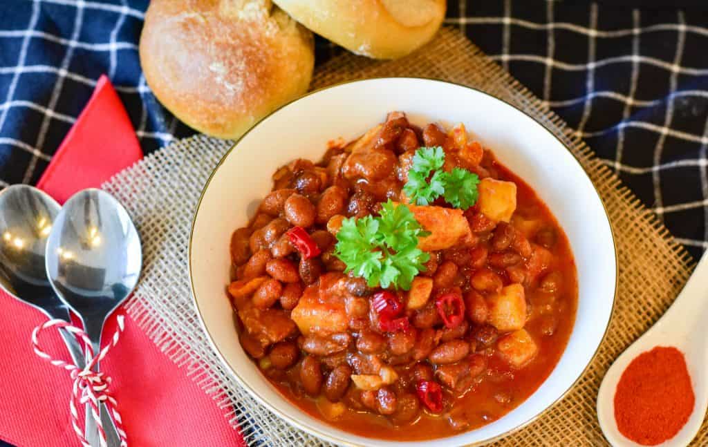 bean chili and bread on bowl